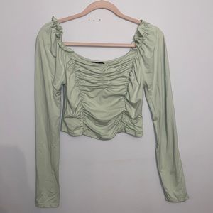 Green ruched long sleeve crop top